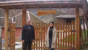 Daughter Sanja Knezevic and father Dragan Knezevic at the entrance to the ethno village Latkovac