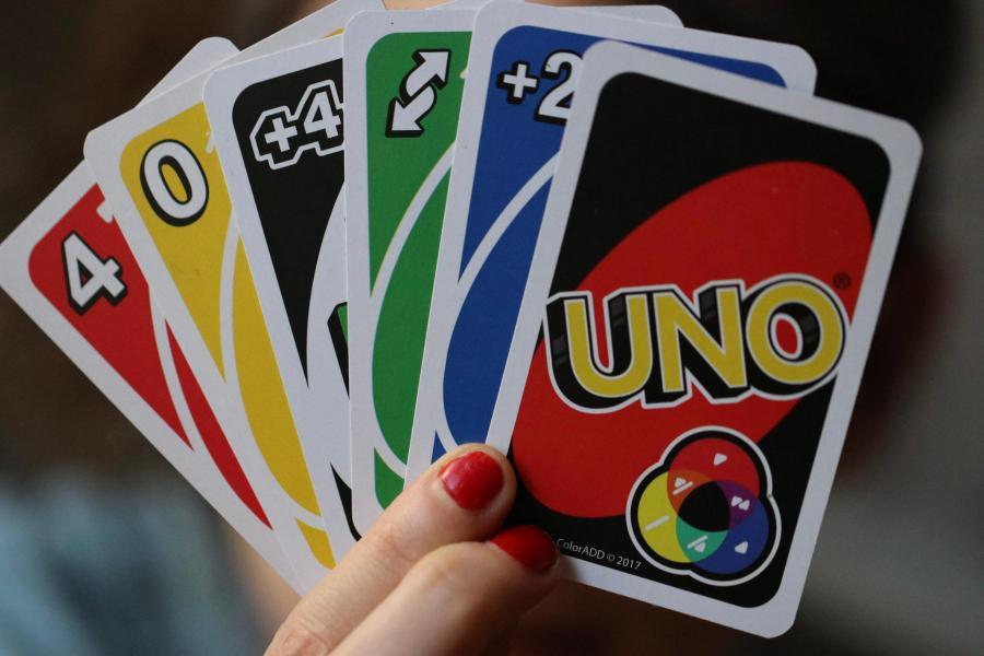 This set of the UNO card game is colour-coded for the colour-blind, using the ColorADD system. ©Chris Welsch