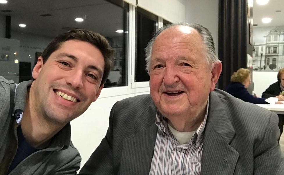 Alberto Cabanes, left, and his “adopted” grandfather, Bernardo, at a retirement home in Ciudad Real, Spain. Cabanes’s company gives elderly people more social interaction. ©Adopta un Abuelo